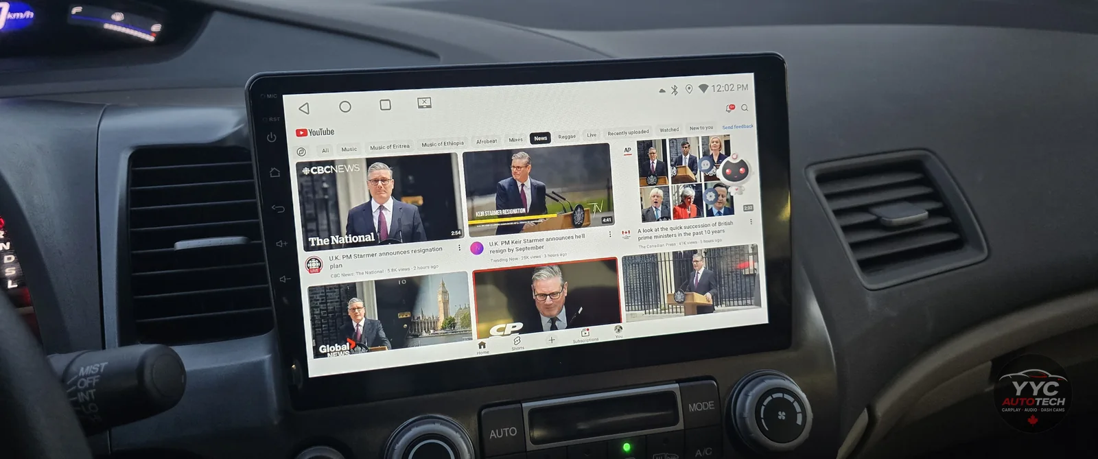 2008 Honda Civic completed Android touchscreen installation showing YouTube on the screen