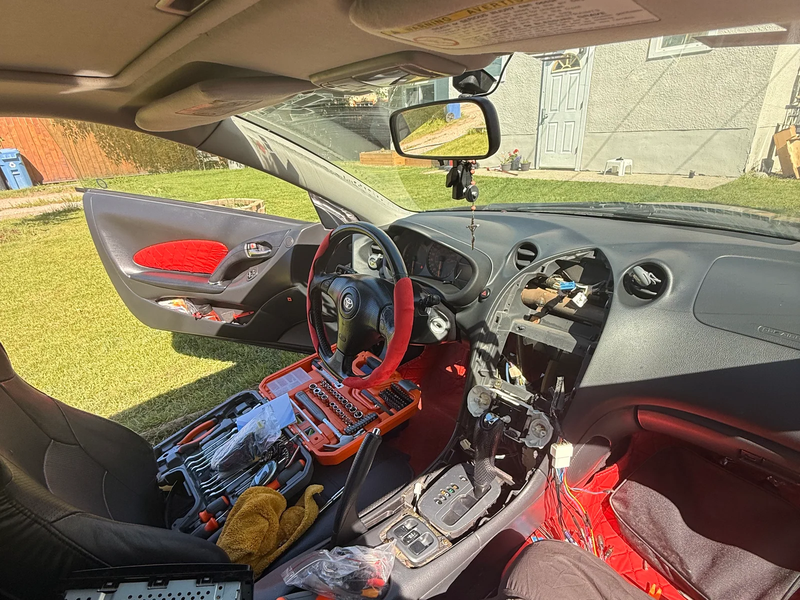 2007 Toyota Celica dashboard opened before CarPlay screen and amp integration